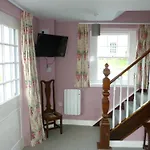 The Coach House, *