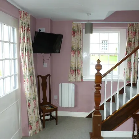 The Coach House, *